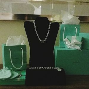Tiffany set $750 , necklace and bracelet